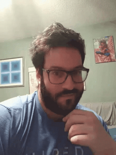 Man With Beard And Glasses In Blue Loaded Shirt GIF