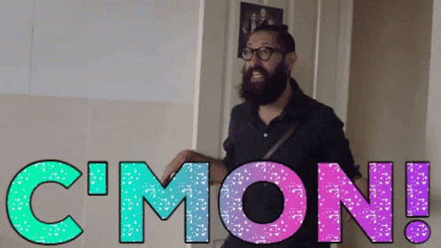 Man With Beard And Glasses In Front Of C'mon Sign GIF
