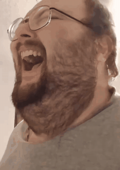 Man With Beard And Glasses Laughing GIF