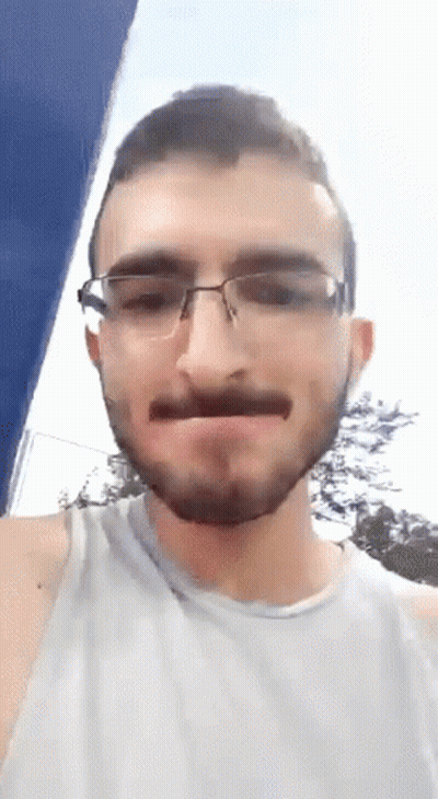 Man With Beard And Glasses Making Funny Face GIF