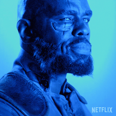 Man With Beard And Glasses On Netflix Background GIF