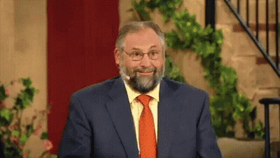 Man With Beard And Glasses Talking Into Microphone GIF