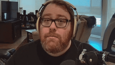 Man With Beard And Glasses Wearing Headphones GIF