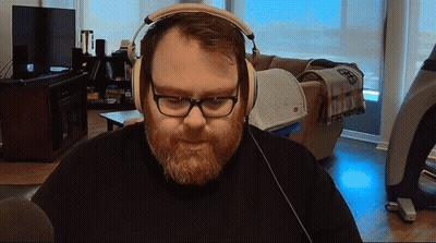 Man With Beard And Glasses Wearing Headphones GIF
