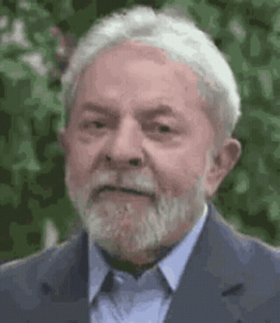 Man With Beard And Gray Hair In Blue Suit GIF