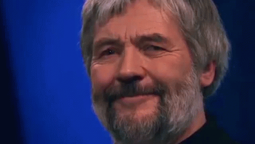 Man With Beard And Gray Hair Smiling GIF