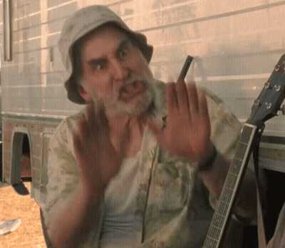 Man With Beard And Hat Holding Guitar GIF