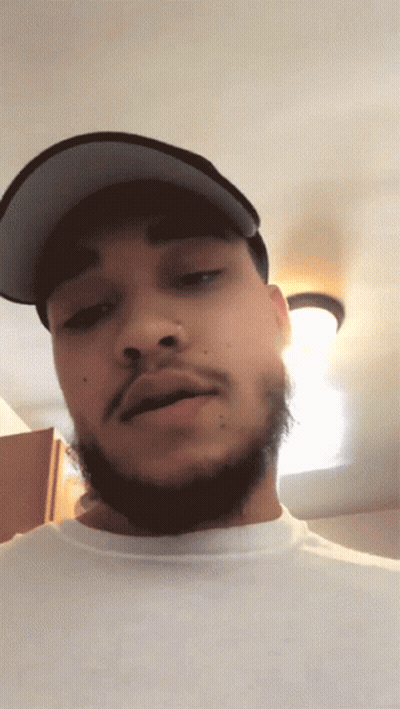 Man With Beard And Hat Looking At Camera GIF