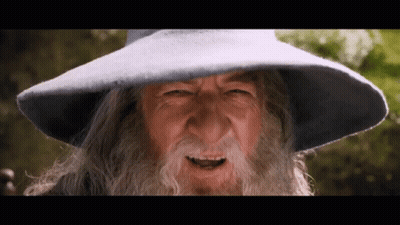 Man With Beard and Hat Looking at Camera