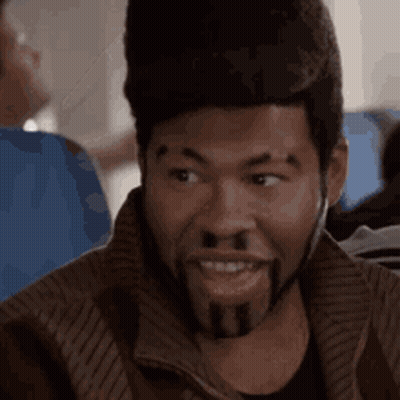 Man With Beard And Hat Sitting On Plane GIF