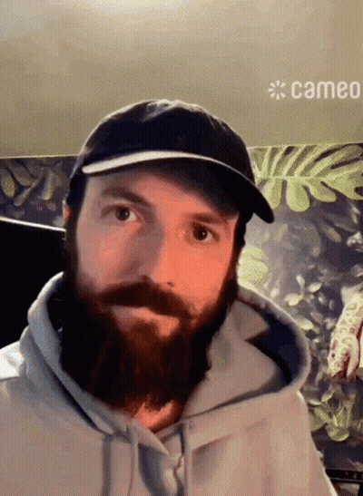 Man With Beard And Hat With Cameo Logo GIF