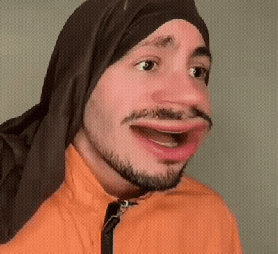 Man With Beard And Head Scarf Making Funny Face GIF