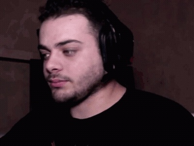 Man With Beard And Headphones Looking Down GIF
