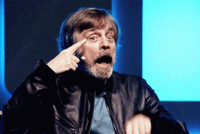 Man With Beard And Leather Jacket Pointing At Forehead GIF