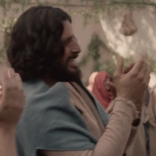 Man With Beard And Long Hair Clapping In Crowd GIF