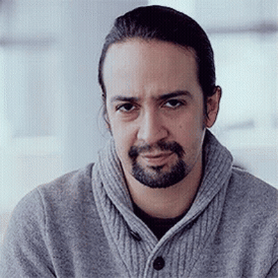 Man With Beard And Long Hair In Gray Sweater GIF