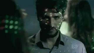 Man With Beard And Mask Looking At Camera GIF