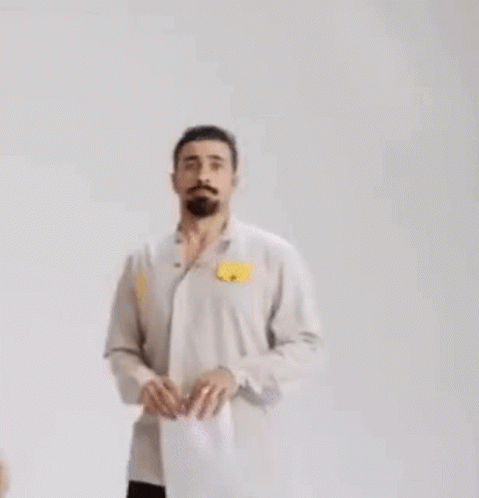 Man With Beard And Mustache In White Shirt GIF