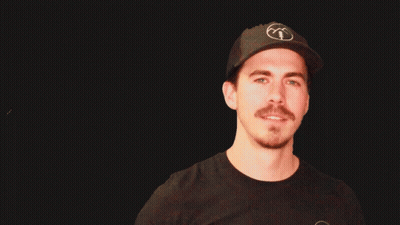 Man With Beard And Mustache Looking At Camera GIF