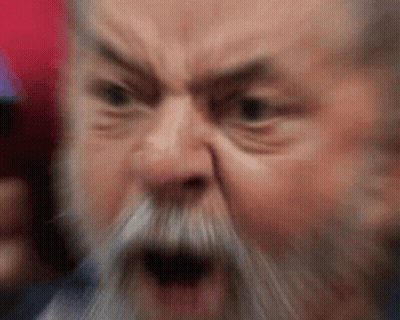 Man With Beard And Mustache Making Angry Face GIF