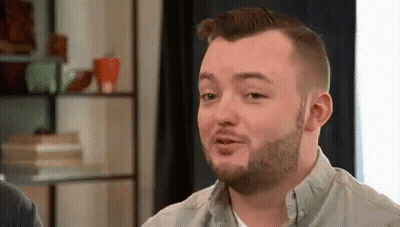 Man With Beard And Mustache Making Funny Face GIF