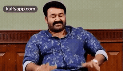 Man With Beard And Mustache Sitting Eyes Closed GIF
