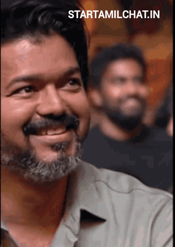 Man With Beard And Mustache Smiling GIF