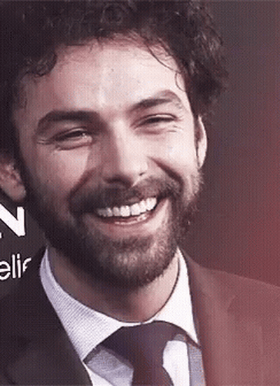 Man With Beard And Mustache Smiling In Suit GIF