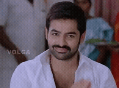 Man With Beard And Mustache Smiling In White Shirt GIF