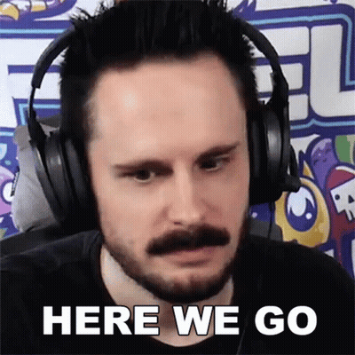 Man With Beard And Mustache Wearing Headphones Saying Here We Go GIF
