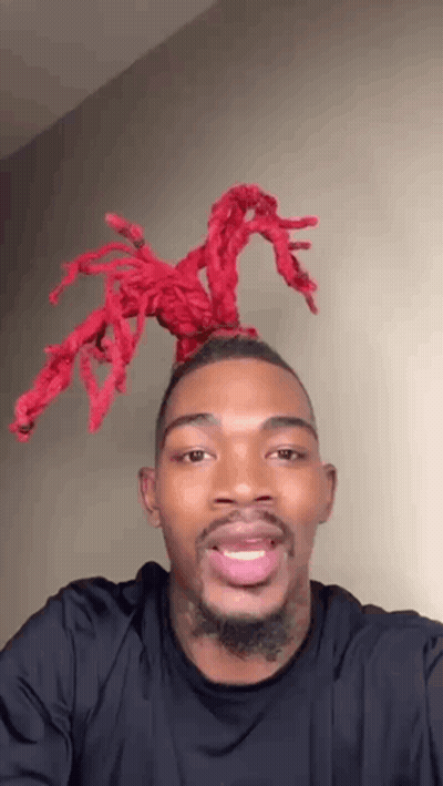 Man With Beard And Red Dreadlocks Smiling GIF