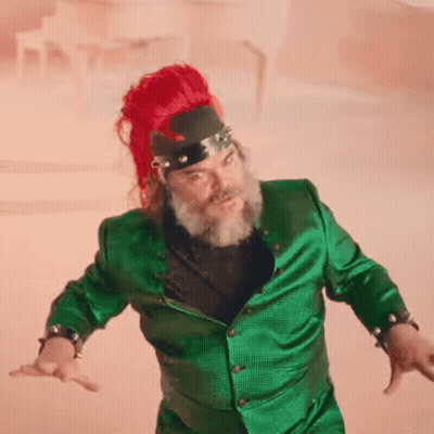 Man With Beard And Red Hair In Green Jacket And Red Hat GIF