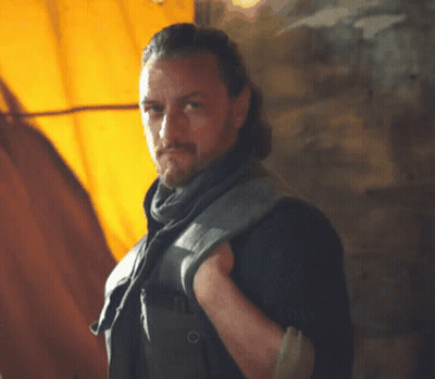 Man With Beard And Scarf Looking At Camera GIF