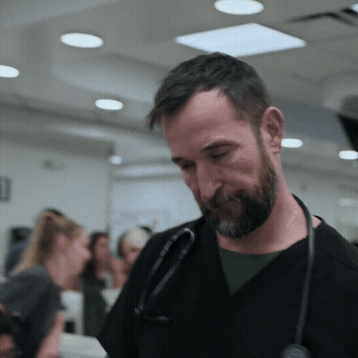 Man With Beard And Stethoscope Looking Down GIF
