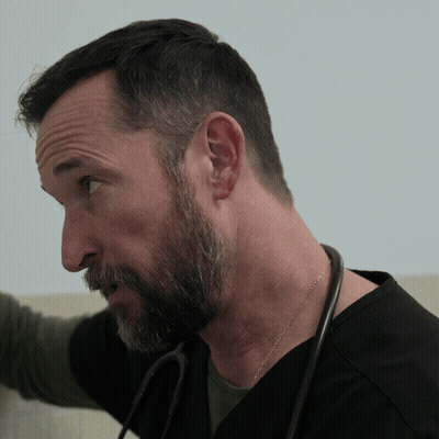 Man With Beard And Stethoscope Looking To Side GIF