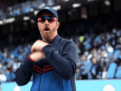 Man With Beard And Sunglasses Clapping In Stadium GIF