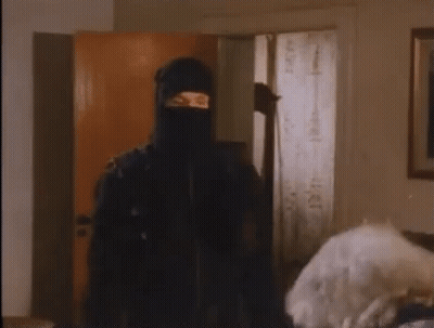 Man With Beard And White Hair Making A Fist GIF