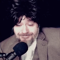 Man With Beard And Wig Speaking GIF