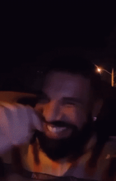 Man With Beard And Yellow Shirt Smiling GIF