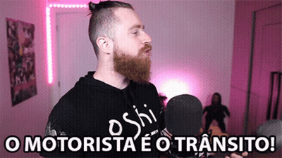 Man With Beard At Microphone Saying O Motorista GIF