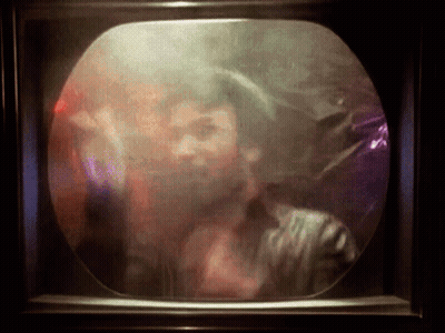 Man With Beard Behind Smokey Screen GIF