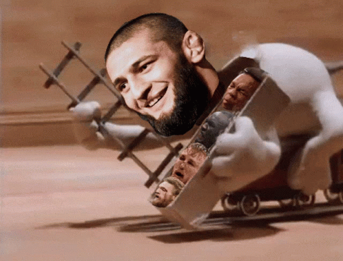 Man With Beard Being Pulled GIF