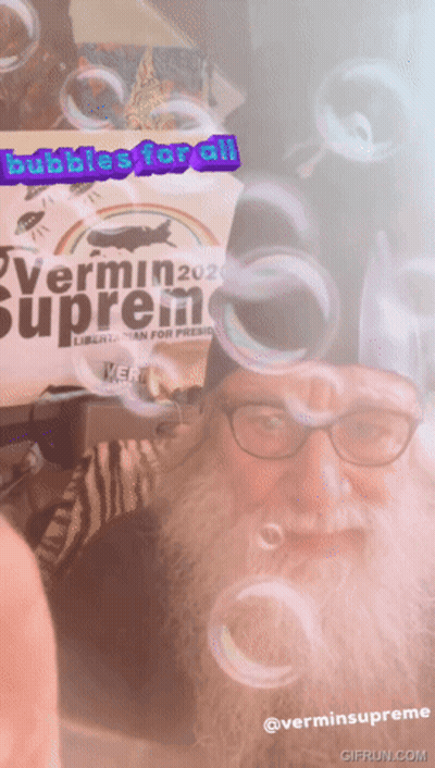 Man With Beard Blowing Bubbles Vermin Supreme GIF