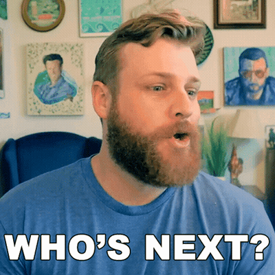 Man With Beard Blue Shirt Says Who's Next GIF