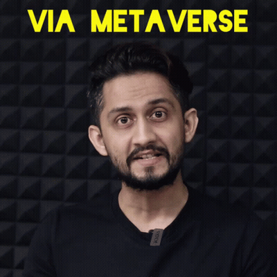 Man With Beard Clapping In Front Of Via Metaverse Wall GIF