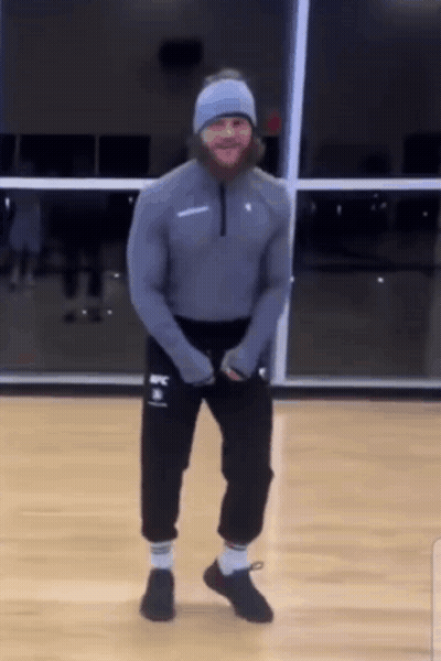 Man With Beard Dancing In Gym Wearing UFC Sweatshirt GIF