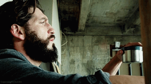 Man With Beard Drinking From Steel Cup GIF