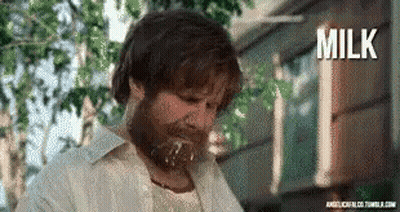 Man With Beard Drinking Milk From Container GIF