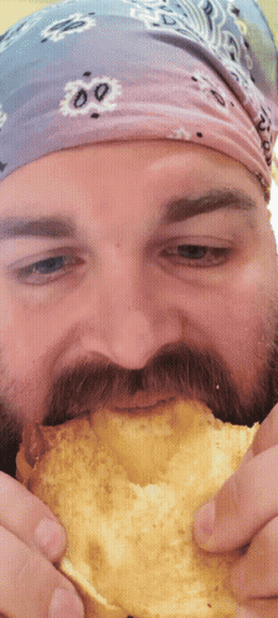 Man With Beard Eating Bread GIF