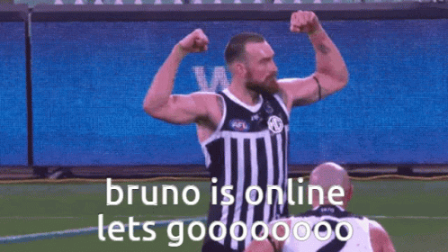 Man With Beard Flexing Muscles GIF